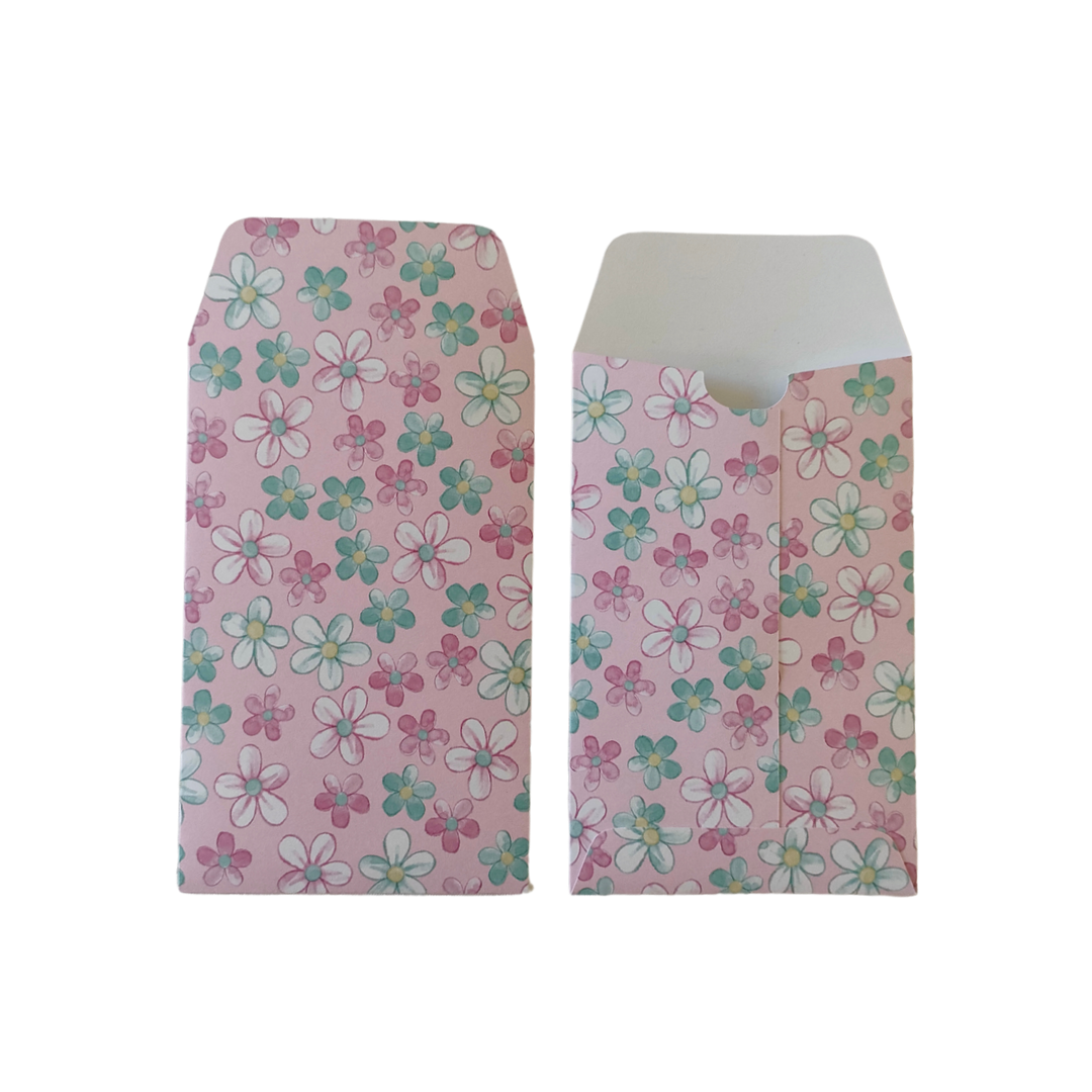 Floral-patterned envelopes on a white background