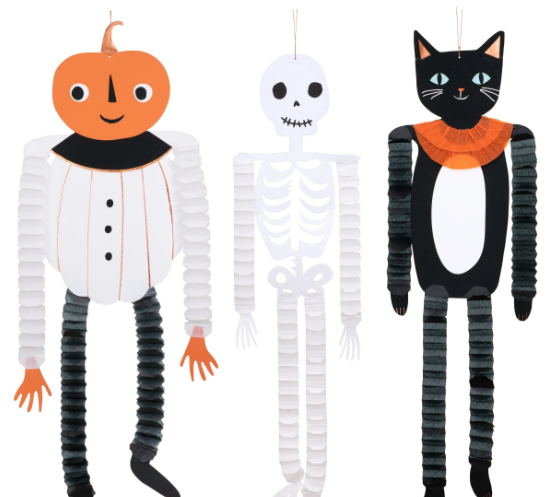 Three Halloween-themed decorations: a pumpkin, skeleton, and cat.