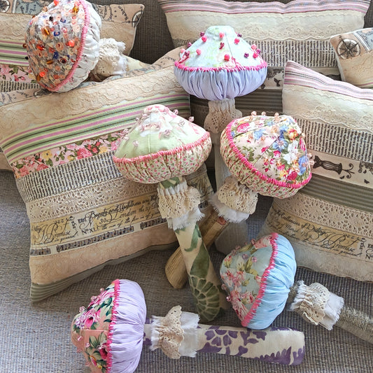 Decorative pillows with floral patterns on a textured surface