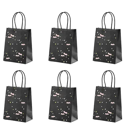 Set of six black gift bags with star and moon designs on a white background