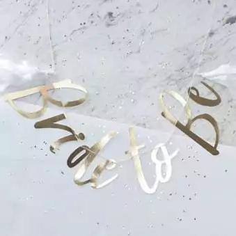 Gold 'Bride to Be' banner on a light gray background