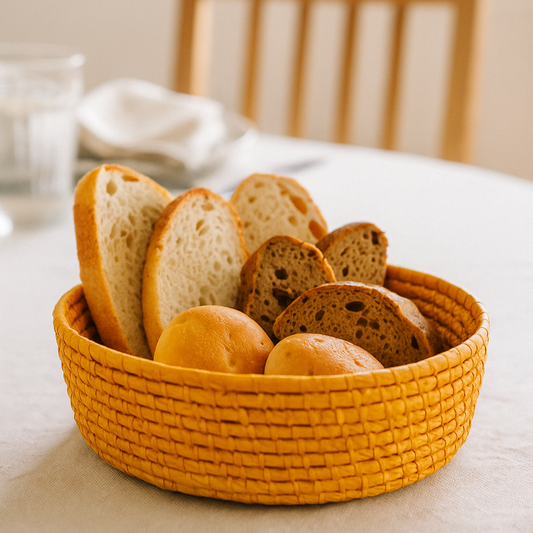 Basket of bread on a table with a blurred background