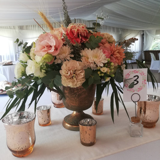Rose Gold Votive on a Table