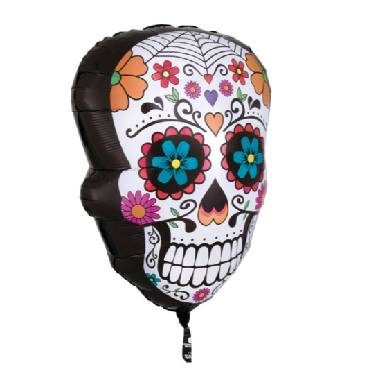 Decorative balloon shaped like a sugar skull with colorful floral patterns on a white background