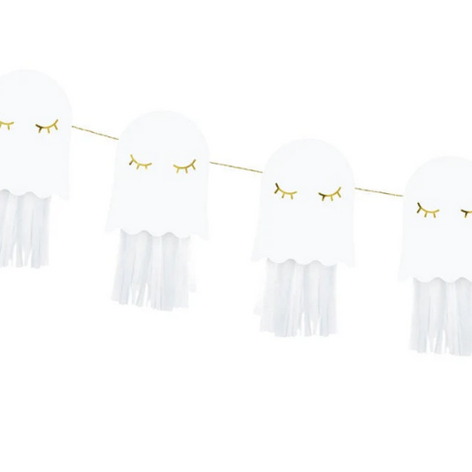 Decorative banner with tassels and gold eye shapes on a white background