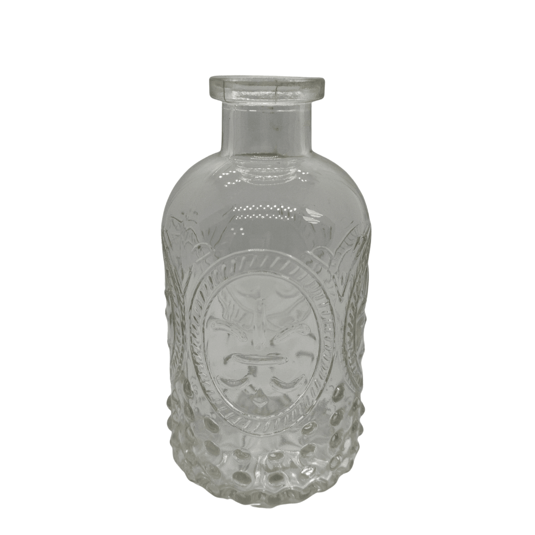 vintage-embossed-clear-glass-bottle