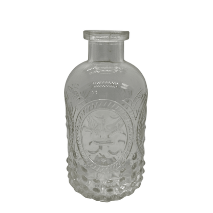 vintage-embossed-clear-glass-bottle